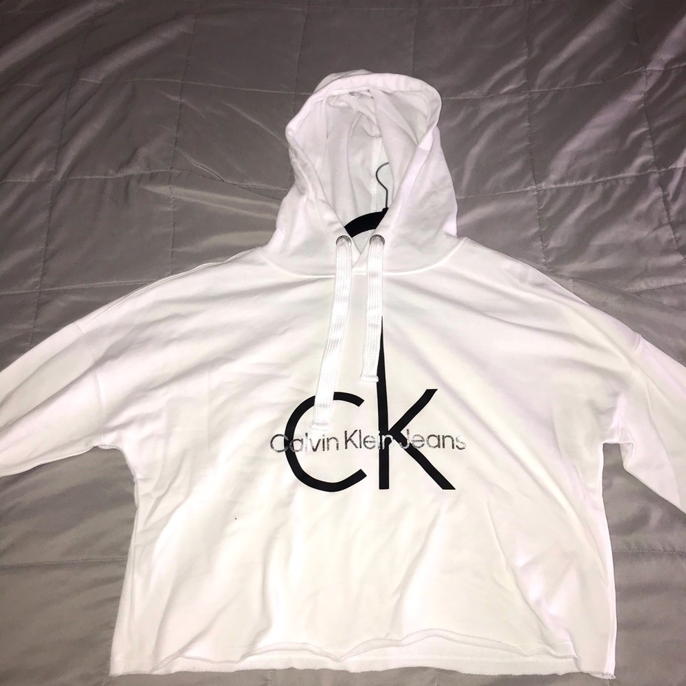 Calvin Klein cropped sweater. Never been worn, tag still on.